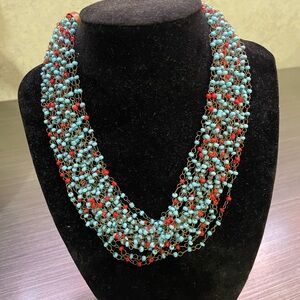 Coral and turquoise layered necklace. Tiny copper accents throughout.